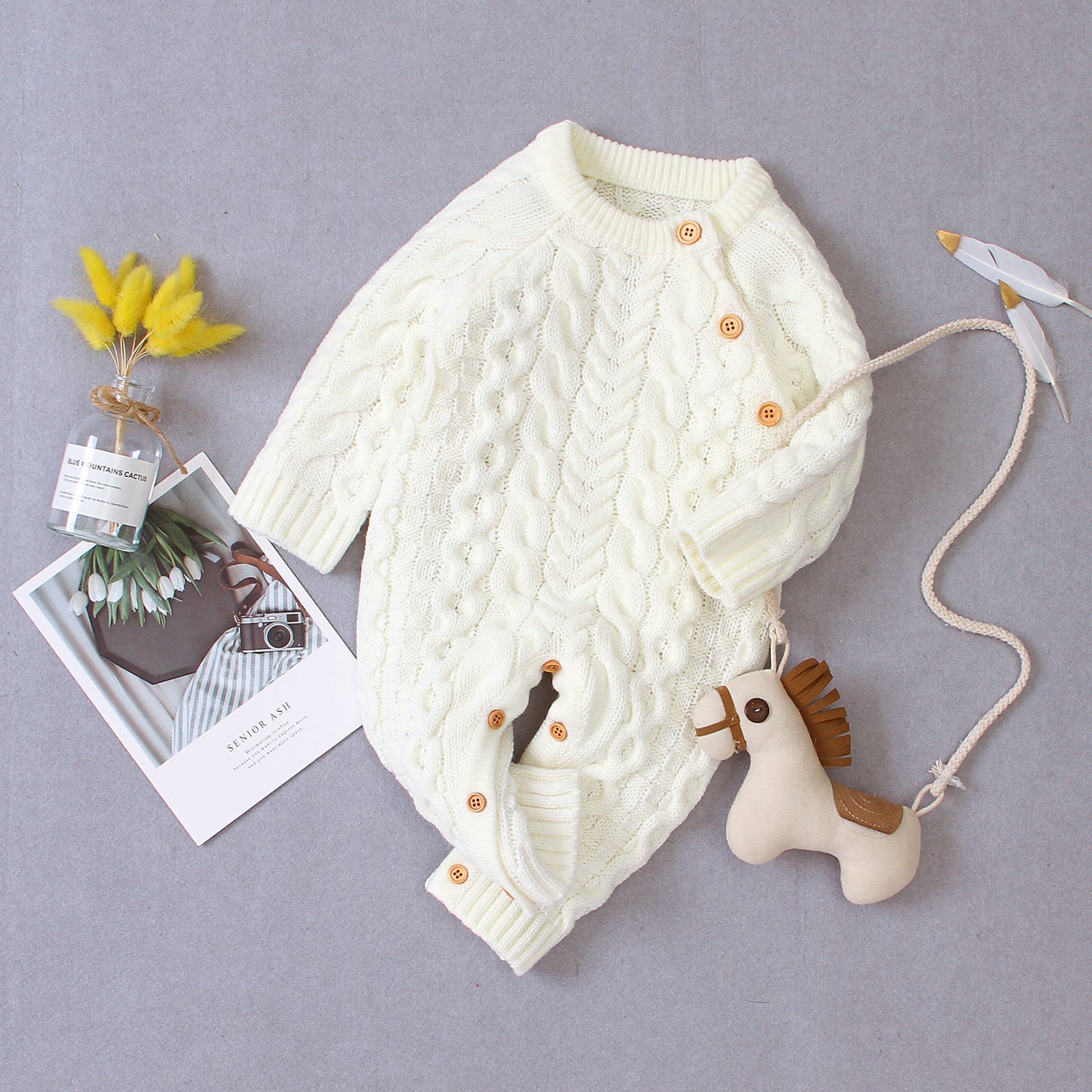 Cozy and Stylish: Knitted Solid Color Baby Jumpsuit for Comfortable Wear