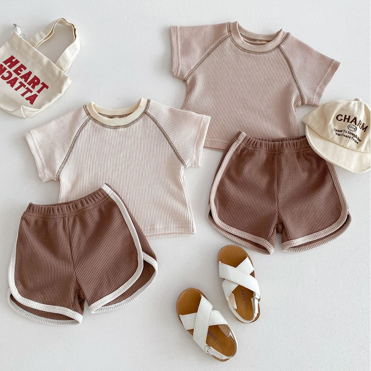 Summer Chic: Unisex Baby Short Sleeve Outfit - Top and Shorts Combo for Sunny Days!