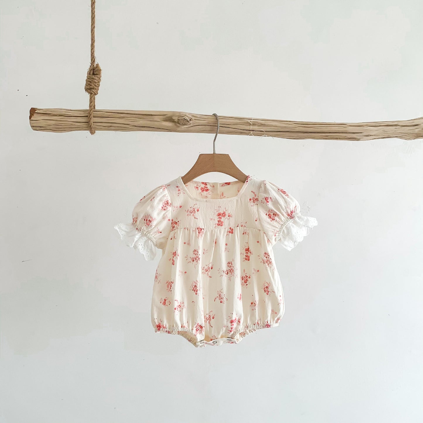 Discover Exquisite Elegance: Short Sleeve Triangle Romper with Foreign Style Floral Lace